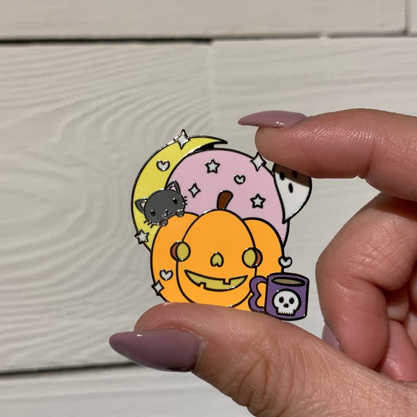 “spooky but cute pumpkin” magnetic enamel pin